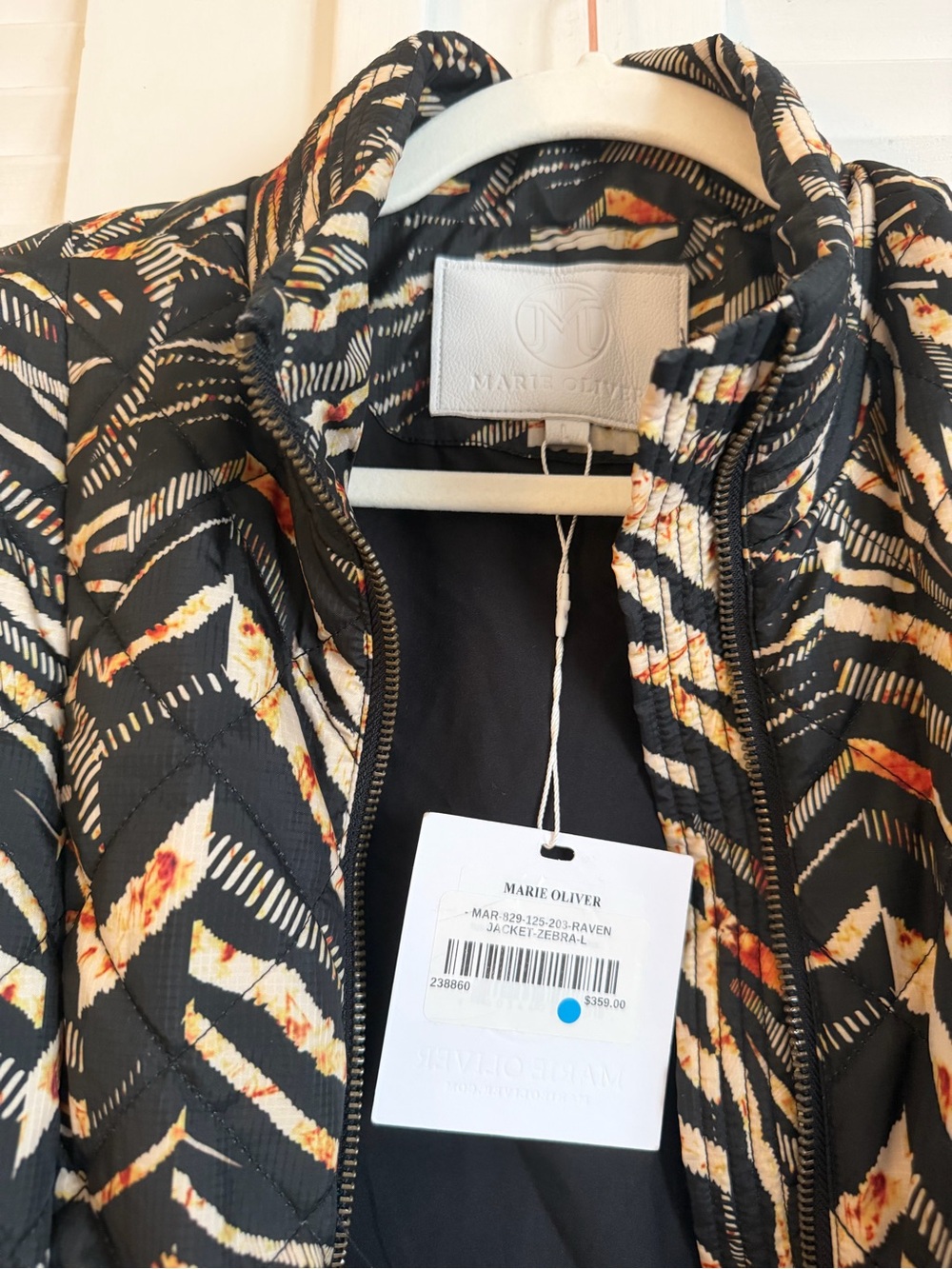 Marie Oliver Black Quilted Jacket with Cream and Yellow Floral Accents - Picture 4 of 4